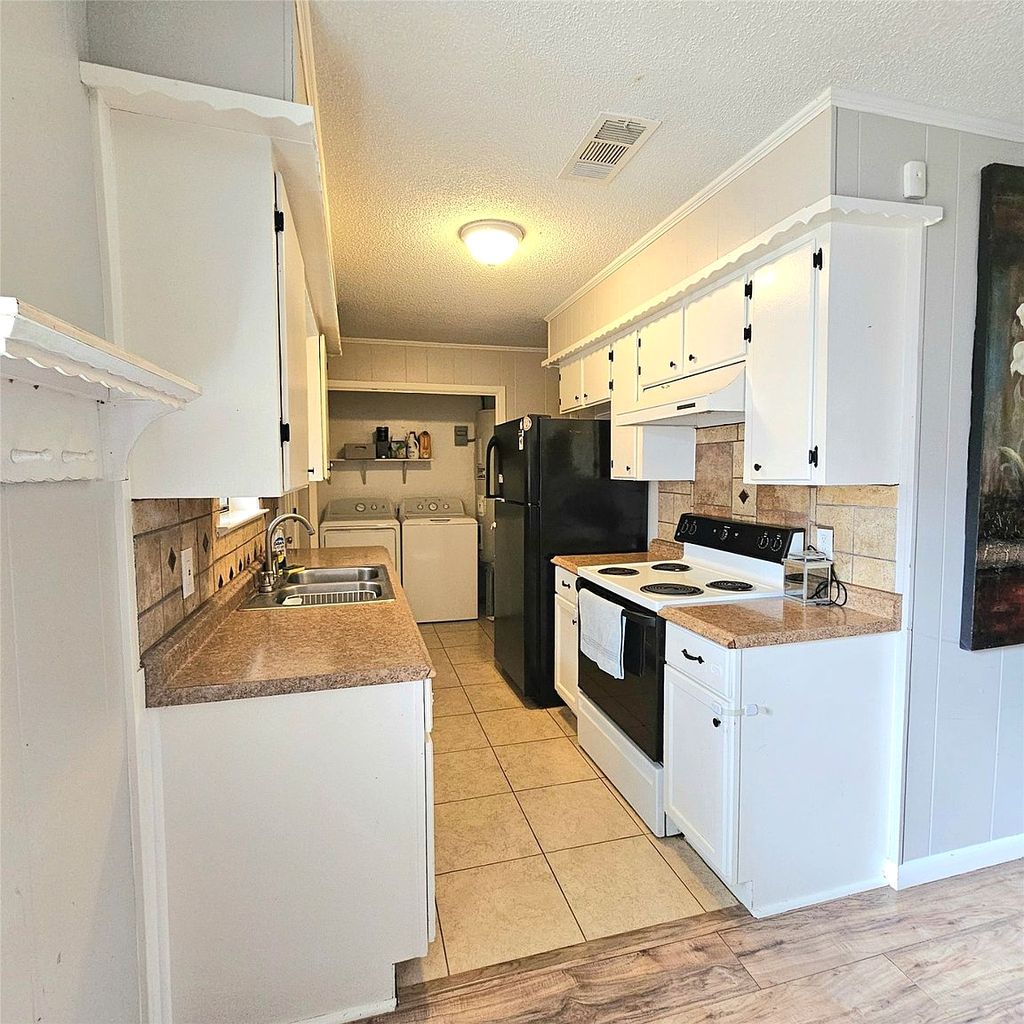 Spacious family home with kitchen and living area